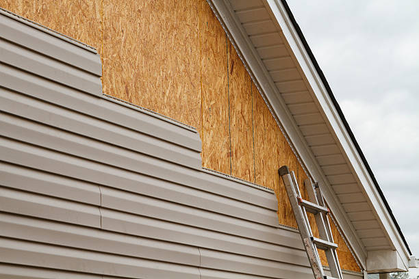 Professional Siding Installation technician working in Beverly, MA